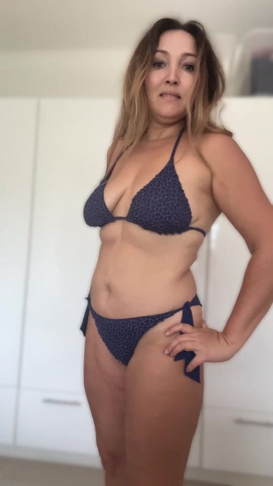 Kat after, fifteen kilos lighter, August 2026